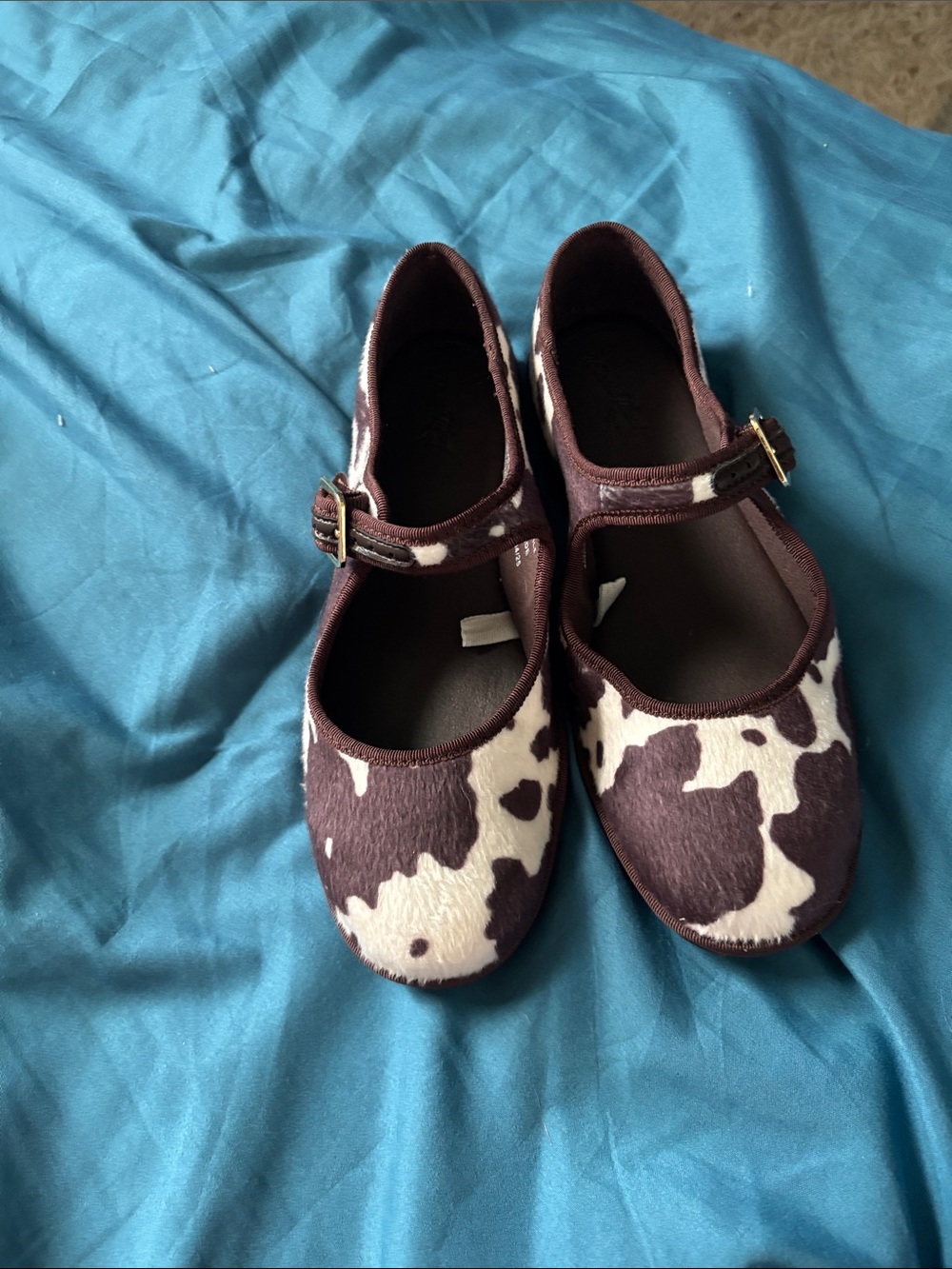Cow print shoes fit like a 7